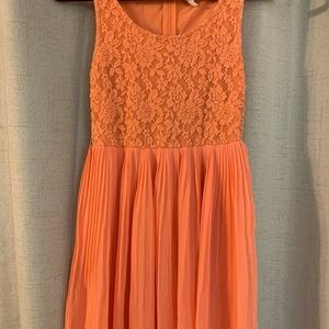 Adorable coral, slightly above knee length dress
